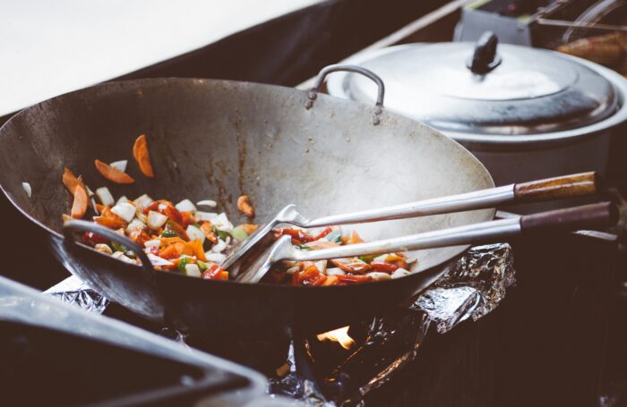 Cooking vegetables in large pan